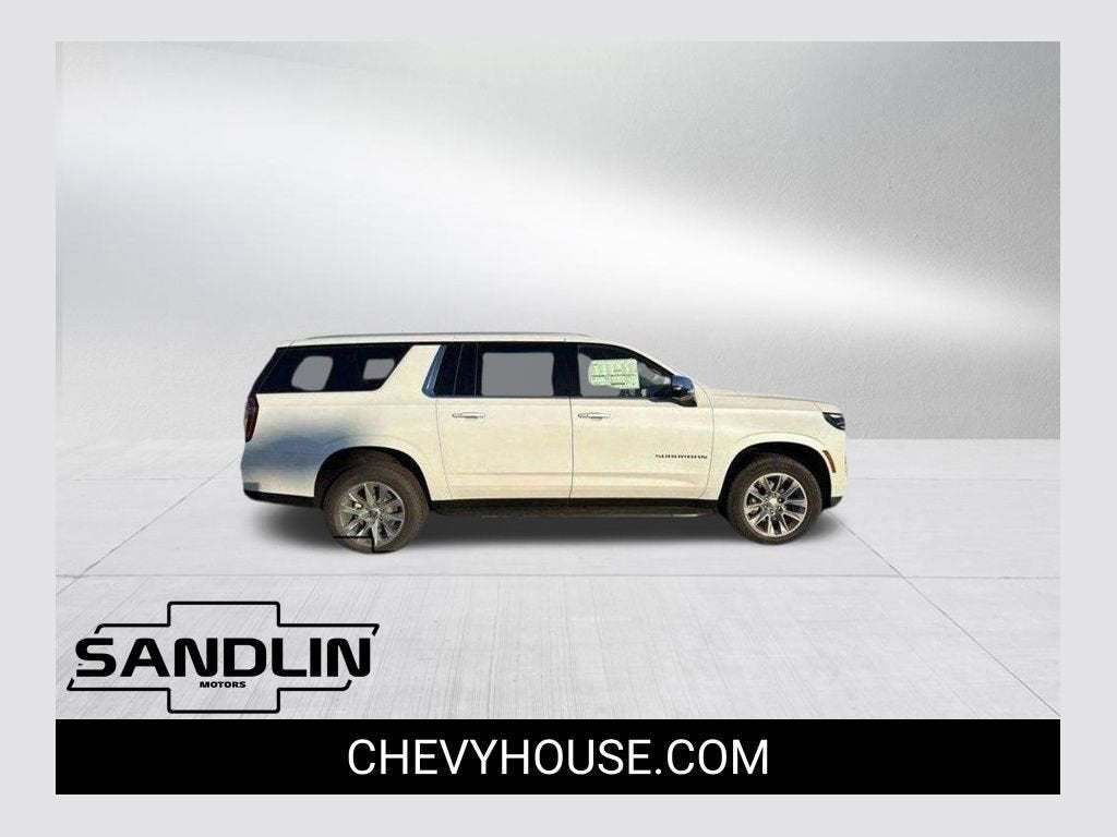 2026 Chevrolet Suburban Premier in Polar White Tricoat — front three-quarter view